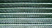 クリーニング後の熱交換器 天井ビルトイン形エアコン